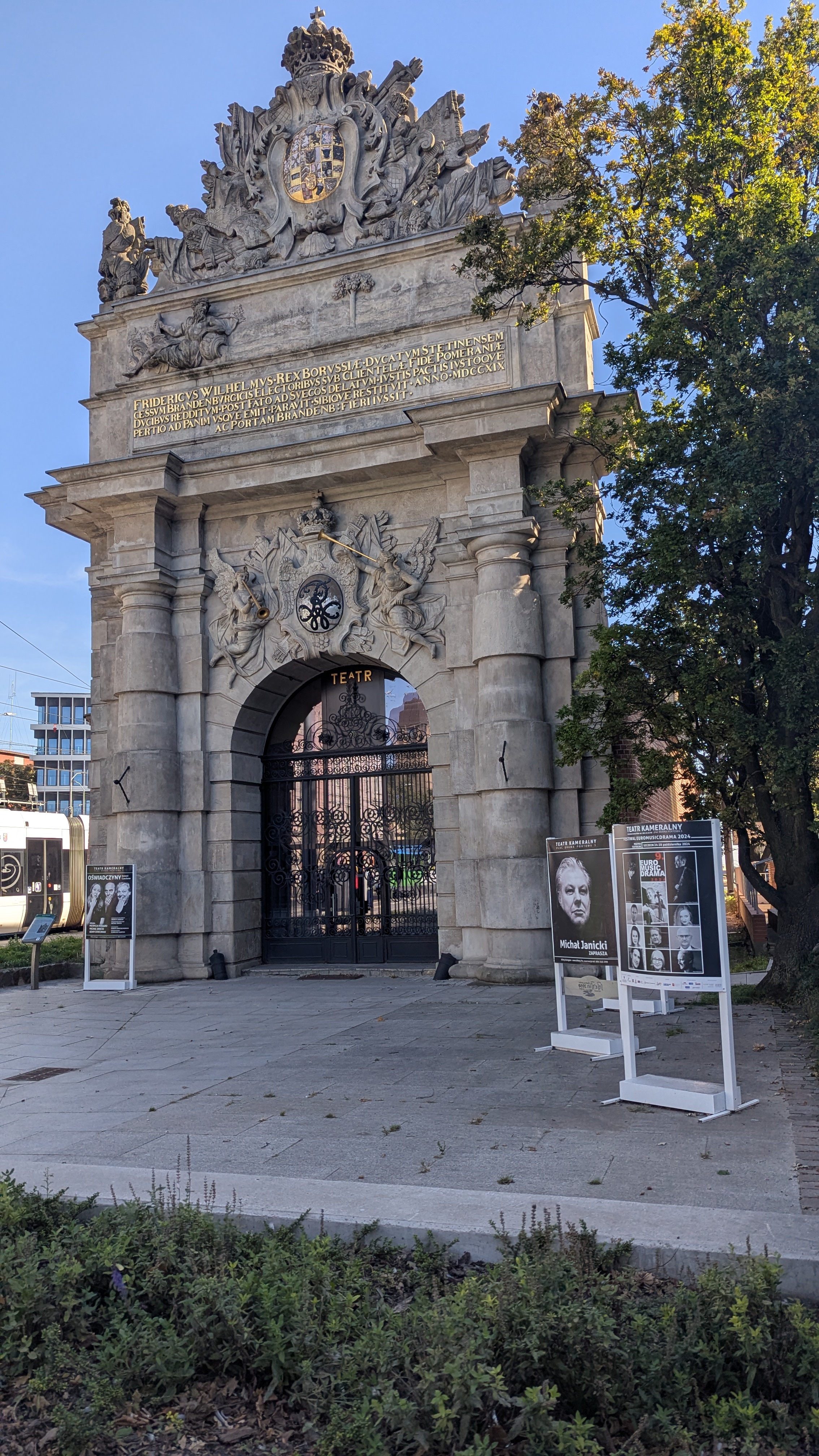Portrait in Poland setting: Historical, monument, stone, classical, landmark, civic.